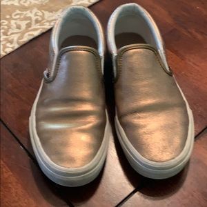 Gold slip on vans